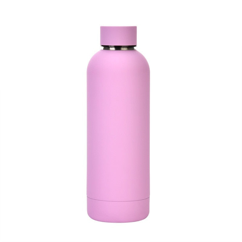 Eine pinke doppelwandige Thermosflasche mit einem Deckel.